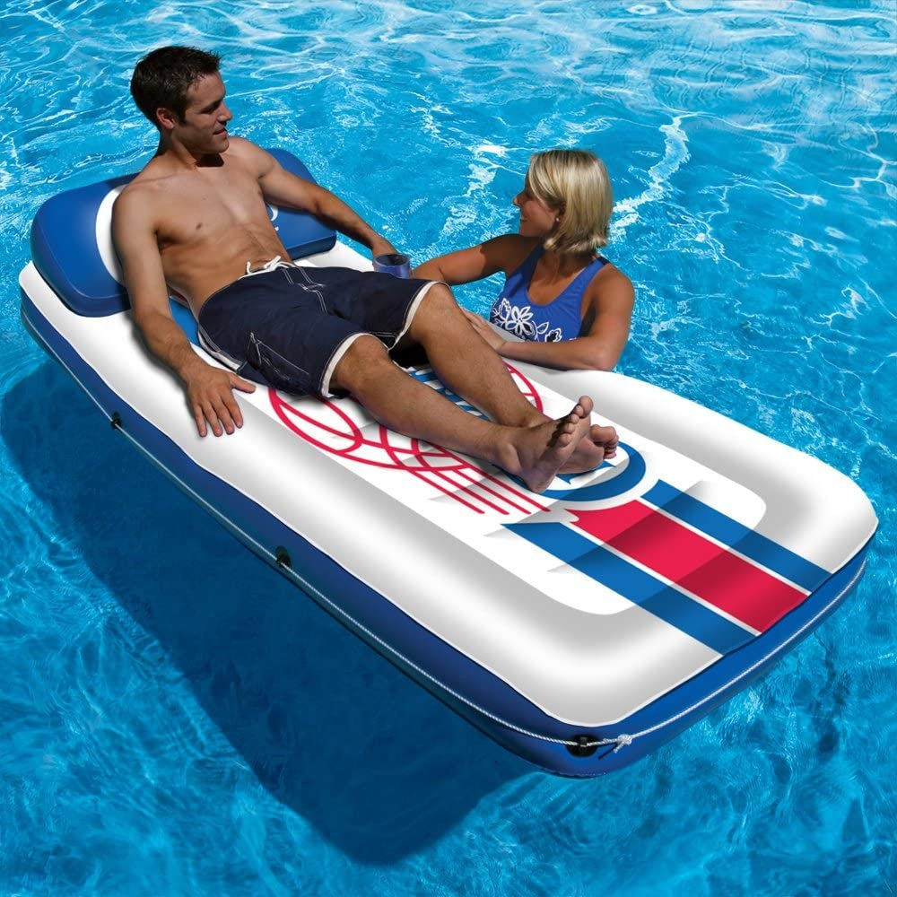 Pool mattress with Los Angeles Clippers logos on it.