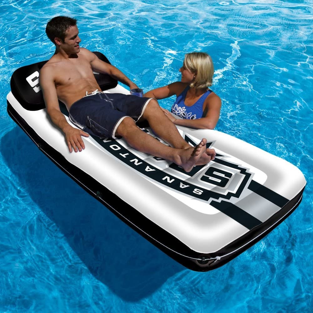 Pool mattress with San Antonio Spurs logos on it.