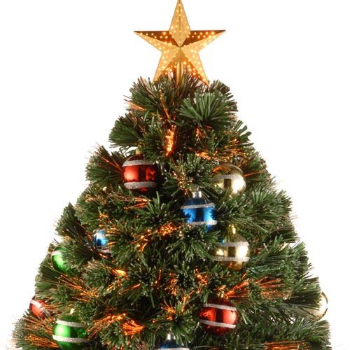 3 ft. fiber optic tree with multi-colored, glittered ball ornaments, a gold base and a star on top.