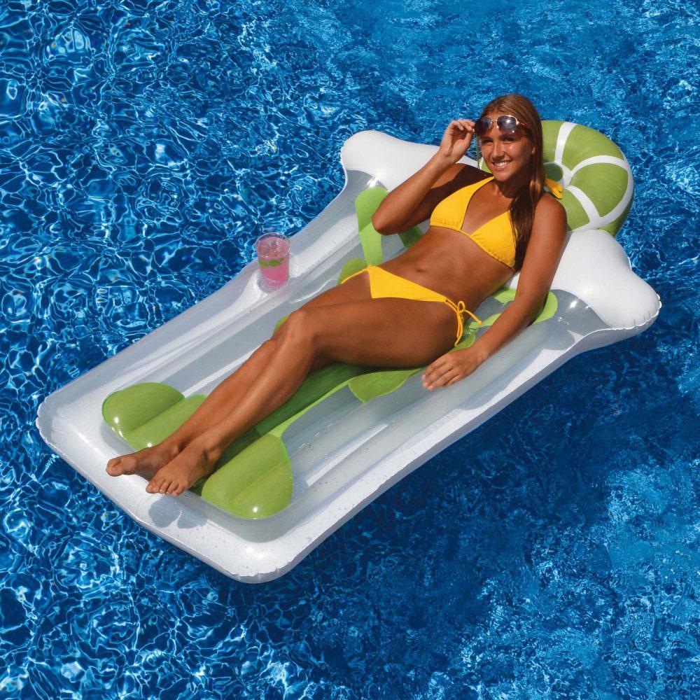 Pool float lounger shaped like a martini glass with a lime on top.