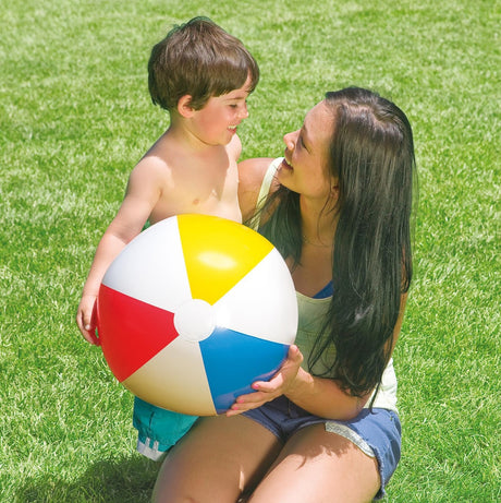 Inflatable beach ball. Colors are white, yellow, red and blue.