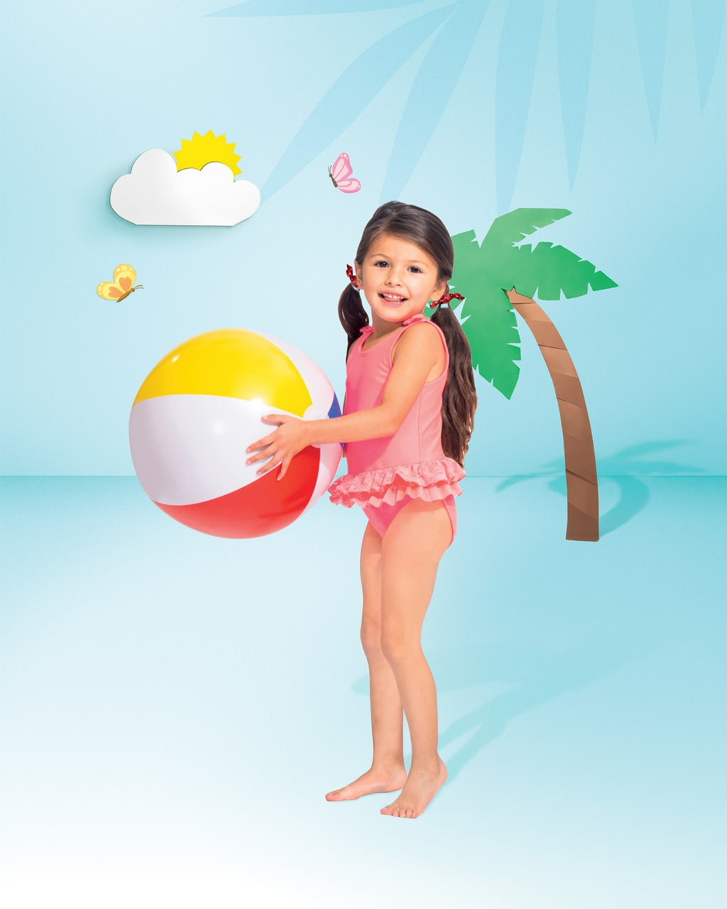 Inflatable beach ball. Colors are white, yellow, red and blue.
