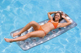 Silver inflatable pool mattress.