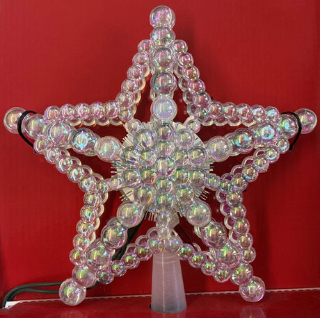 This image shows the iridescent beaded tree star with clear lights.