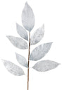 Decorative pick spray that looks like silver leaves on a brown branch.