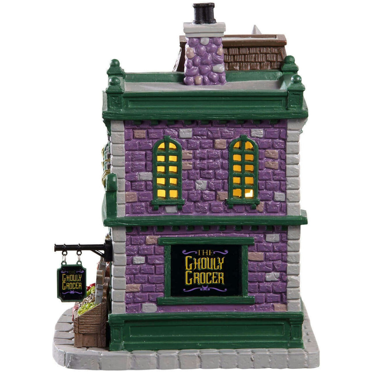 Porcelain lighted building for a Lemax display. Designed to look like a brick grocery store. There are monsters at the front door and boxes of stuff you can buy near the front window. Inside the window, you can see some creepy crawlies hanging from hooks. There are carved pumpkins on the roof.