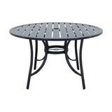 This image shows what the round dining table looks like on a white background.