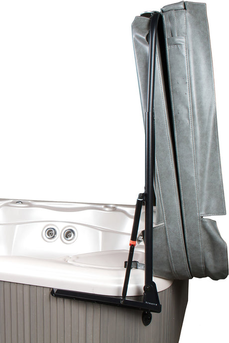 This image shows the Covermate III Eco in use over an open hot tub.