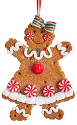 Ornaments made to look like decorated gingerbread cookies.