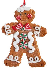 Ornaments made to look like decorated gingerbread cookies.