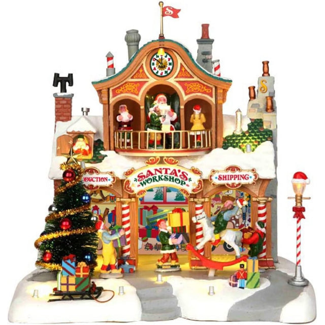 Polyresin lighted building for a Lemax display. Designed to look like Santa's workshop. Decorated for Christmas and with snow on the roof and sidewalk.