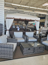 Clearance outdoor patio furniture set with chairs and a table the Tinley Park Outlet store.