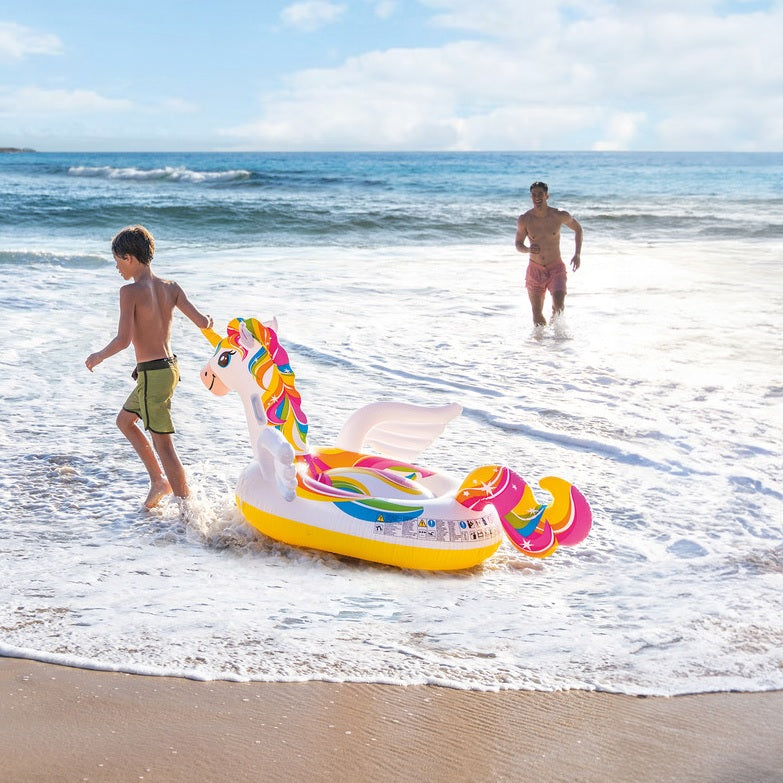 Inflatable pool float shaped like a rainbow unicorn.