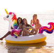 Inflatable pool float shaped like a rainbow unicorn.