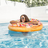 Inflatable inner tube designed to look like a donut with frosting and multi-colored sprinkles.