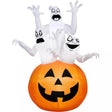 Halloween inflatable shaped like three spooky ghosts jumping out of a large jack-o-lantern.