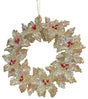 Gold glitter ornament shaped like a wreath with red berry accents.
