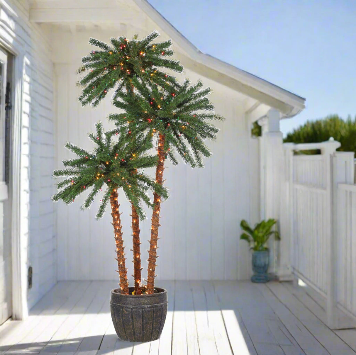 Potted palm tree decoration. Each part of the tree measure 4 ft., 5 ft. and 6 ft. Features 500 incandescent lights. Trunks are covered in Clear lights. Palm Tree Tops are covered in Multi-Colored lights.