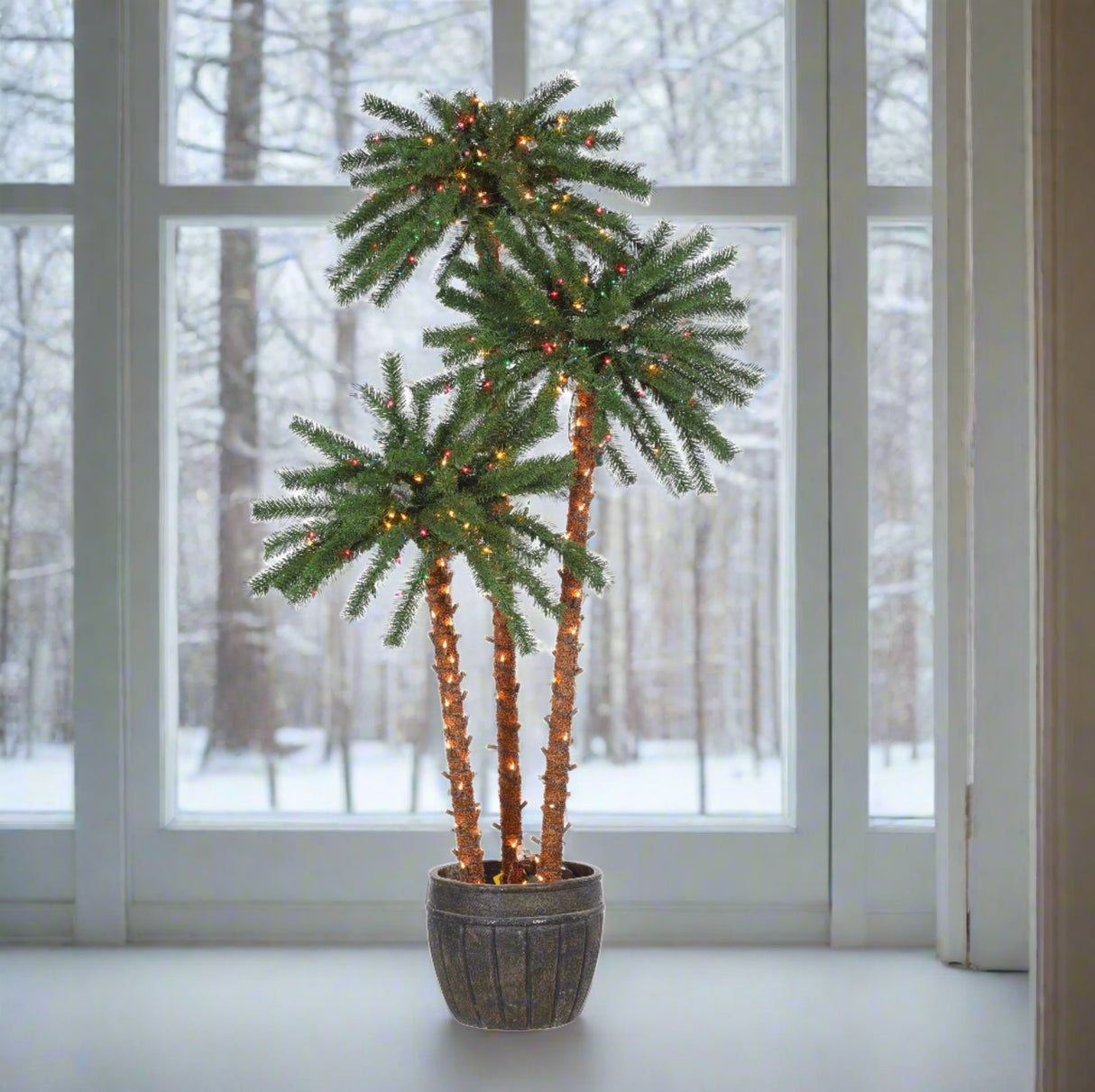 Potted palm tree decoration. Each part of the tree measure 4 ft., 5 ft. and 6 ft. Features 500 incandescent lights. Trunks are covered in Clear lights. Palm Tree Tops are covered in Multi-Colored lights.