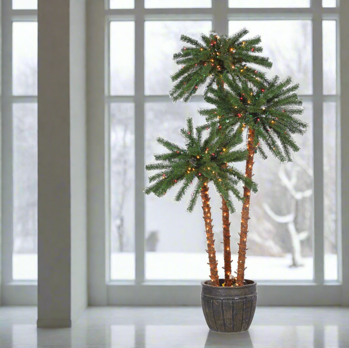 Potted palm tree decoration. Each part of the tree measure 4 ft., 5 ft. and 6 ft. Features 500 incandescent lights. Trunks are covered in Clear lights. Palm Tree Tops are covered in Multi-Colored lights.