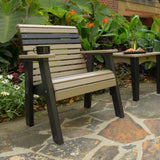 This is the Weatherwood and Black colored bench on a stone patio next to a matching table.