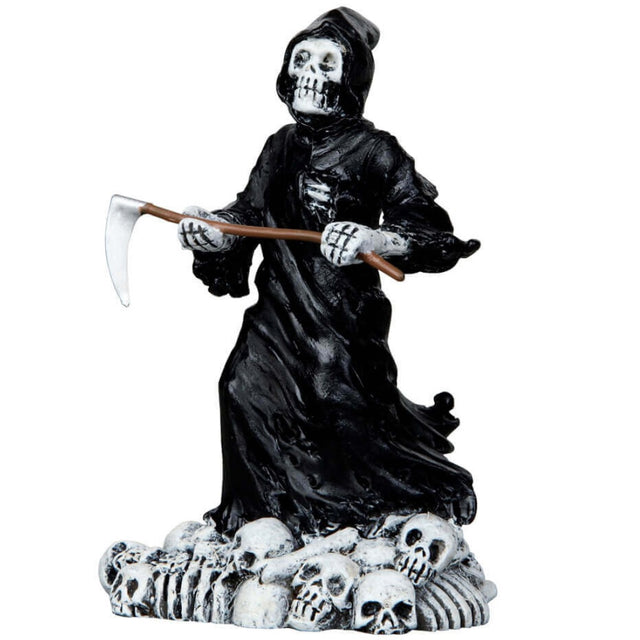 Polyresin figurine for a Lemax Spooky Town display. Designed to look like a grim reaper dressed in an oversized black robe. He's holding a scythe and is standing on a pile of skulls.