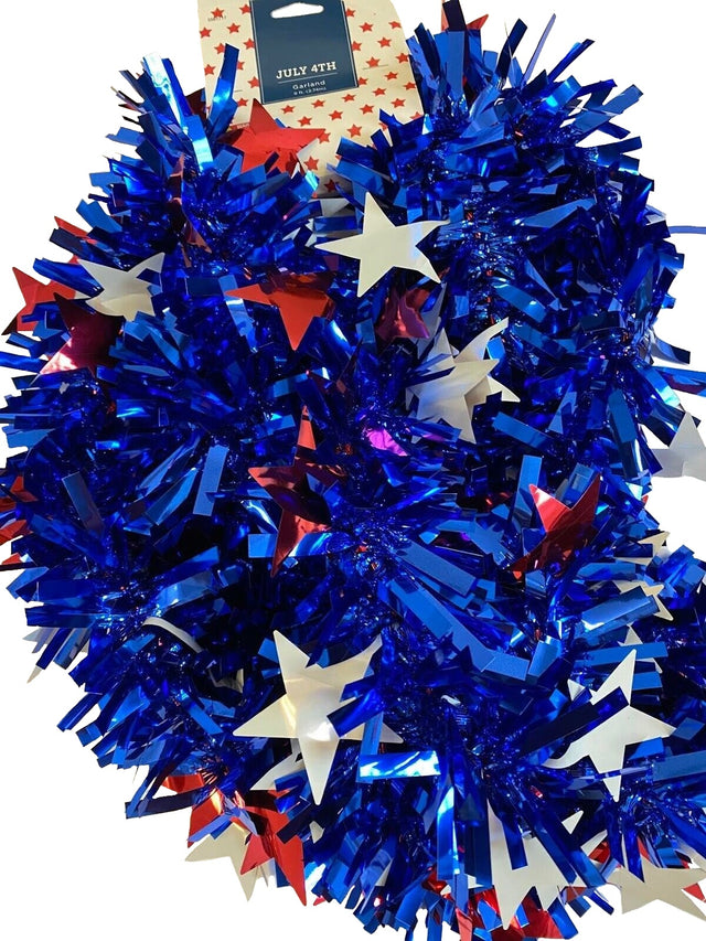 Blue decorating tinsel with red and white tinsel stars.