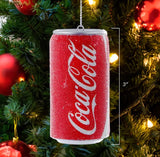 One ornament is red and reads "Coca Cola" in a white, cursive font. One ornament is silver and reads "Diet" in a black, cursive font and "Coke" in red block letters. Beads covering the outside for a frosty-cold look.