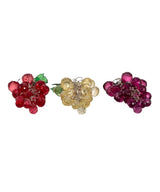 Ornament shaped like a cluster of grapes. There are three options. One is purple, one is green and one is burgundy.