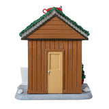 Resin table accent for a Lemax display. Designed to look like a wooden booth that's been decorated for Christmas. This is the back of the booth, showing off the wooden construction and the pale yellow door.