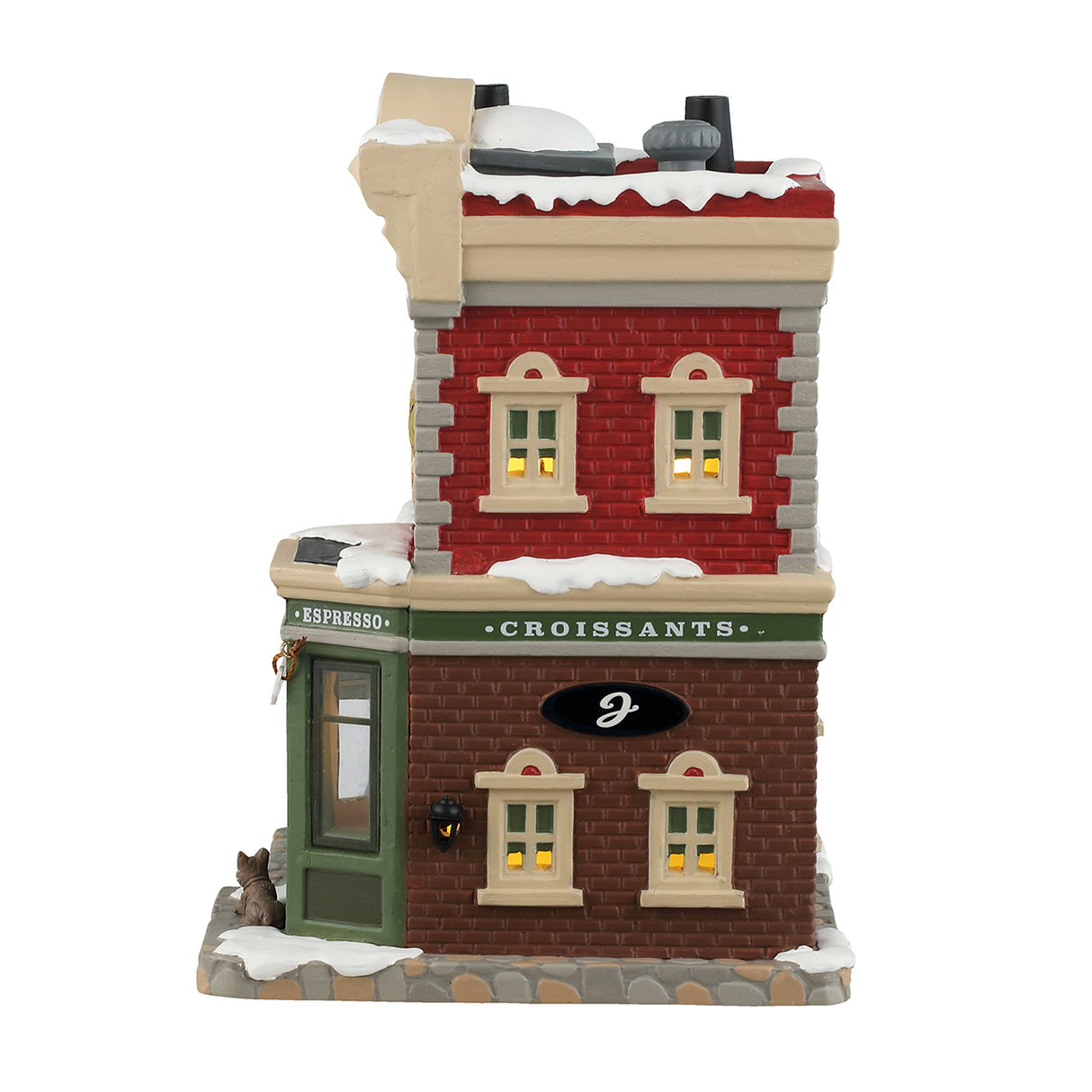Porcelain lighted building for a Lemax tabletop display. Designed to look like a red, gray and brown brick building. There's snow on the roof and the sidewalk. There are signs advertising croissants, coffee, espresso and sandwiches. Inside the window you can see a man sitting at a table. There's a dog sitting under the window on the sidewalk.