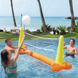 This is a lifestyle image showing three people using the inflatable volleyball net and inflatable volleyball in a pool near the beach.