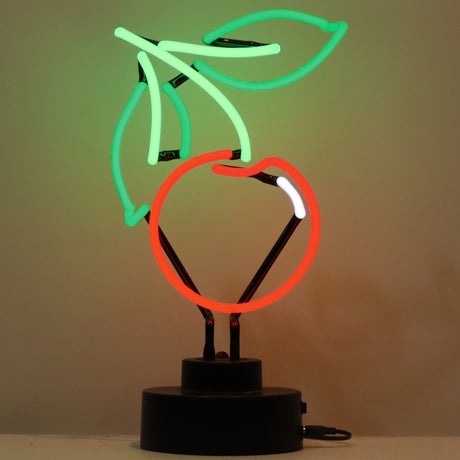 This neon sculpture is shaped like a red cherry with a green stem and two green leaves.