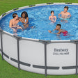This is a lifestyle image showing five people (3 adults and two young kids) swimming in this Bestway Steel Pro MAX pool in a grassy backyard.