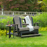 This is a lifestyle image of a Weatherwood and Black Adirondack balcony glider bench with the center console down.