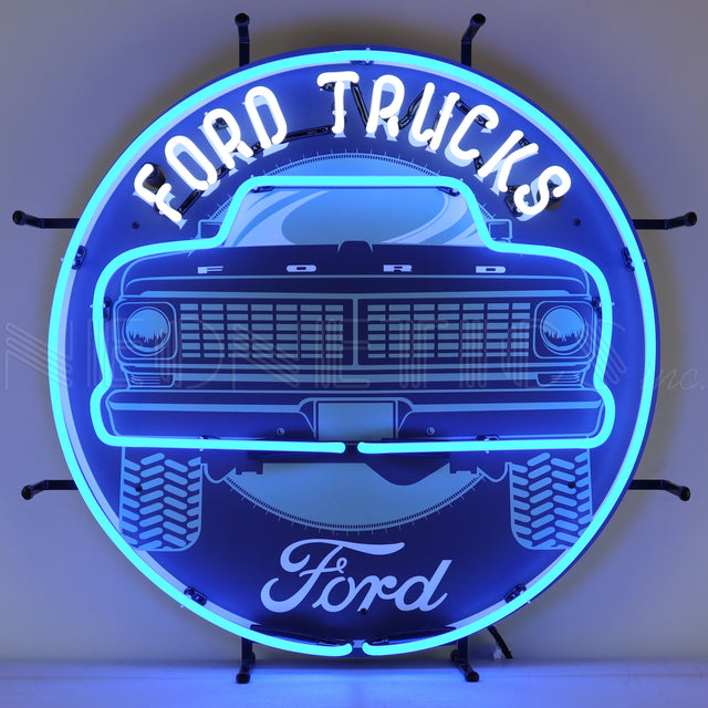 This neon sign reads "FORD TRUCKS" and features a square body Ford truck.