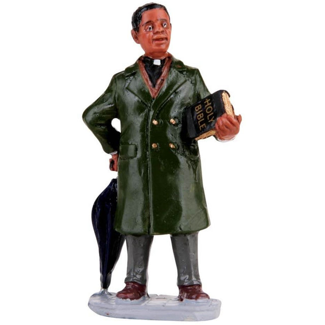 Polyresin figurine for a Lemax display. Designed to look like a preacher wearing a winter coat. He holds an umbrella and the Bible.