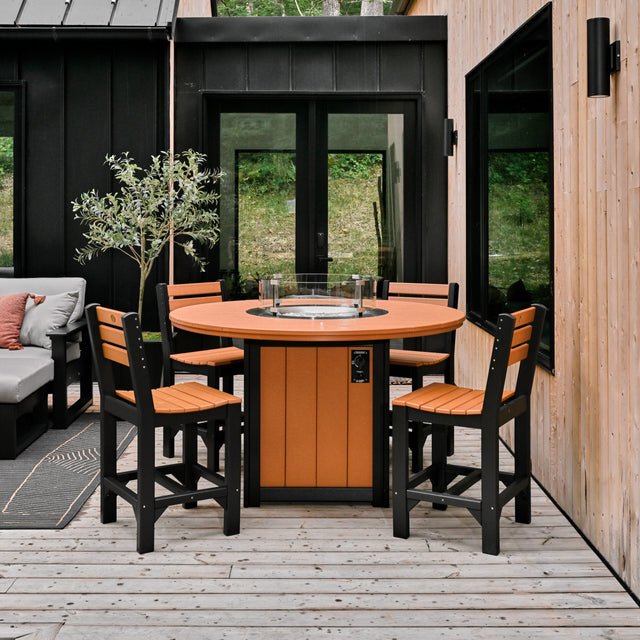 This is a lifestyle image showing the Cedar and Black colored fire table surrounded by matching chairs.