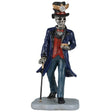 This image shows what this Lemax Spooky Town figurine looks like on a white background. It was designed to look like a skeleton wearing a dark purple coat, a red vest and blue jeans. He's holding a gold pocket watch, a black cane and he's wearing a black top hat with a gold clock on it.