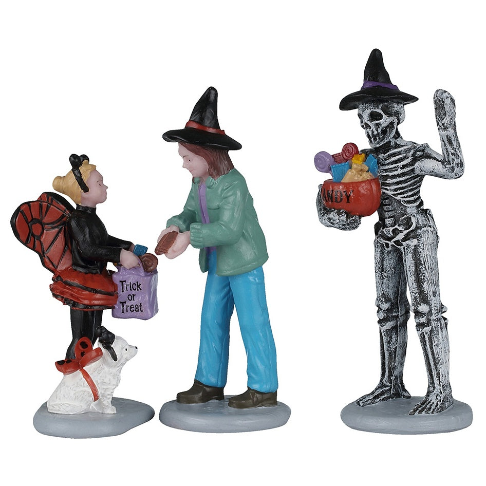 This image shows what these three Lemax Spooky Town figurines look like on a white background.
