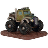 This image shows what this Lemax Spooky Town table accent looks like on a white background. It was designed to look like a monster truck parked in some mud. The roof of the truck is decorated with skulls.