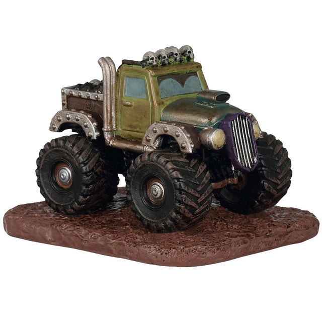 This image shows what this Lemax Spooky Town table accent looks like on a white background. It was designed to look like a monster truck parked in some mud. The roof of the truck is decorated with skulls.
