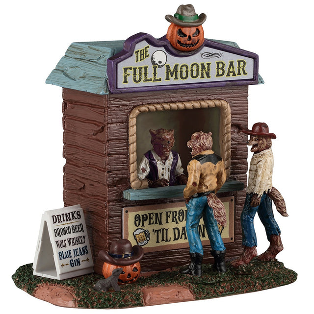 This image shows what this Spooky Town able accent looks like on a white background. It's designed to look like a wooden stall called The Full Moon Bar. There's a werewolf bartender chatting with two werewolf customers. There's a sign off to the side that reads "DRINKS: Bronco Beer, Wolf Whiskey, Blue Jeans Gin." There's a jack-o-lantern on the ground wearing a cowboy hat.