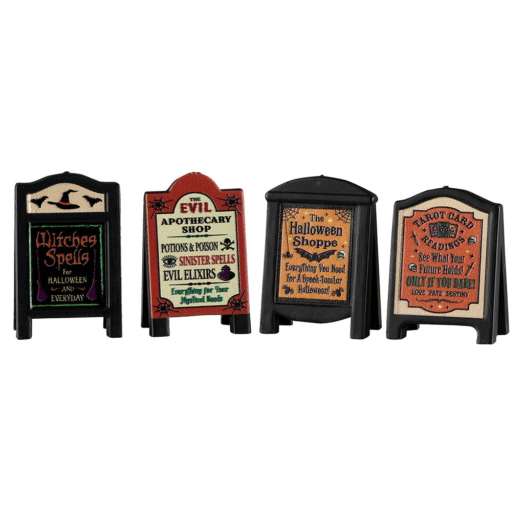 This image shows what these Lemax Spooky Town accessories look like on a white background. There are four signs.