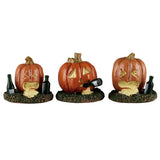 This image shows what these three Lemax Spooky Town accessories look like on a white background. 
