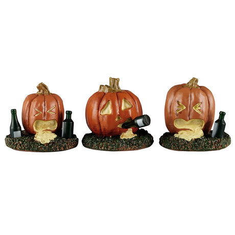 This image shows what these three Lemax Spooky Town accessories look like on a white background. 
