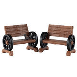 This image shows what these two Lemax Spooky Town accessories look like on a white background. They're designed to look like benches. The arm rests are made out of wheels.