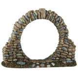 This image shows what this Lemax Spooky Town accessory looks like on a white background. It's designed to look like a circle (gateway) made of stones on a grassy patch.