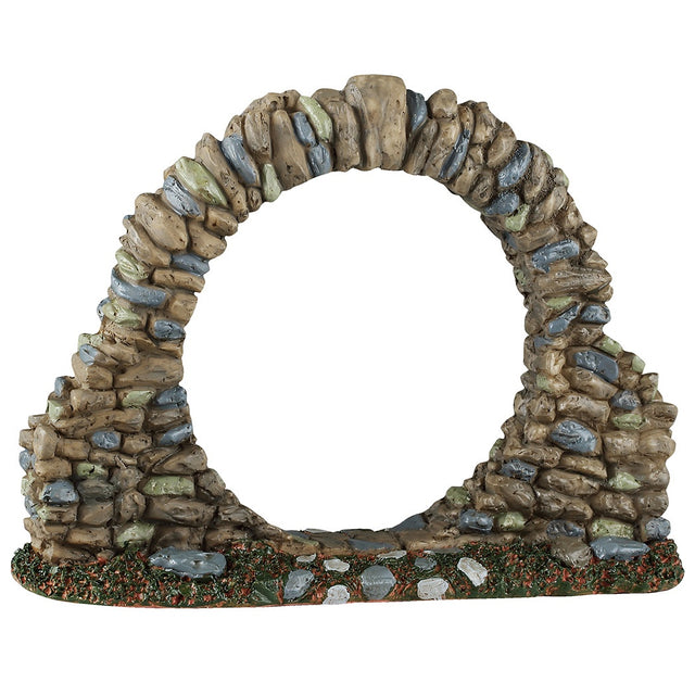 This image shows what this Lemax Spooky Town accessory looks like on a white background. It's designed to look like a circle (gateway) made of stones on a grassy patch.