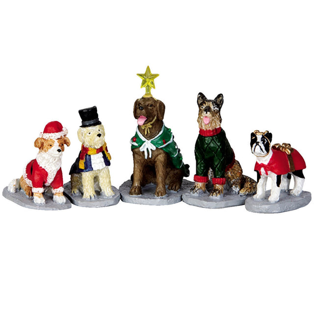 Polyresin figurines for a Lemax display. Designed to look like five dogs wearing Christmas themed costumes. One dog is dressed as Santa. One is wearing a black top hat and a scarf. One is dressed up like a Christmas tree with a star on his head. One is wearing a green and red sweater. The last dog is dressed as a present.